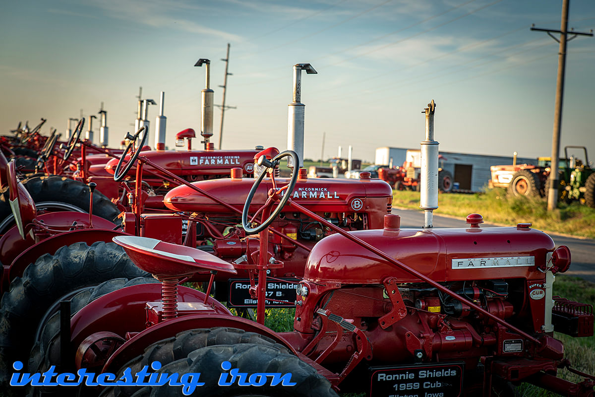 farmall tractors lined up in a row