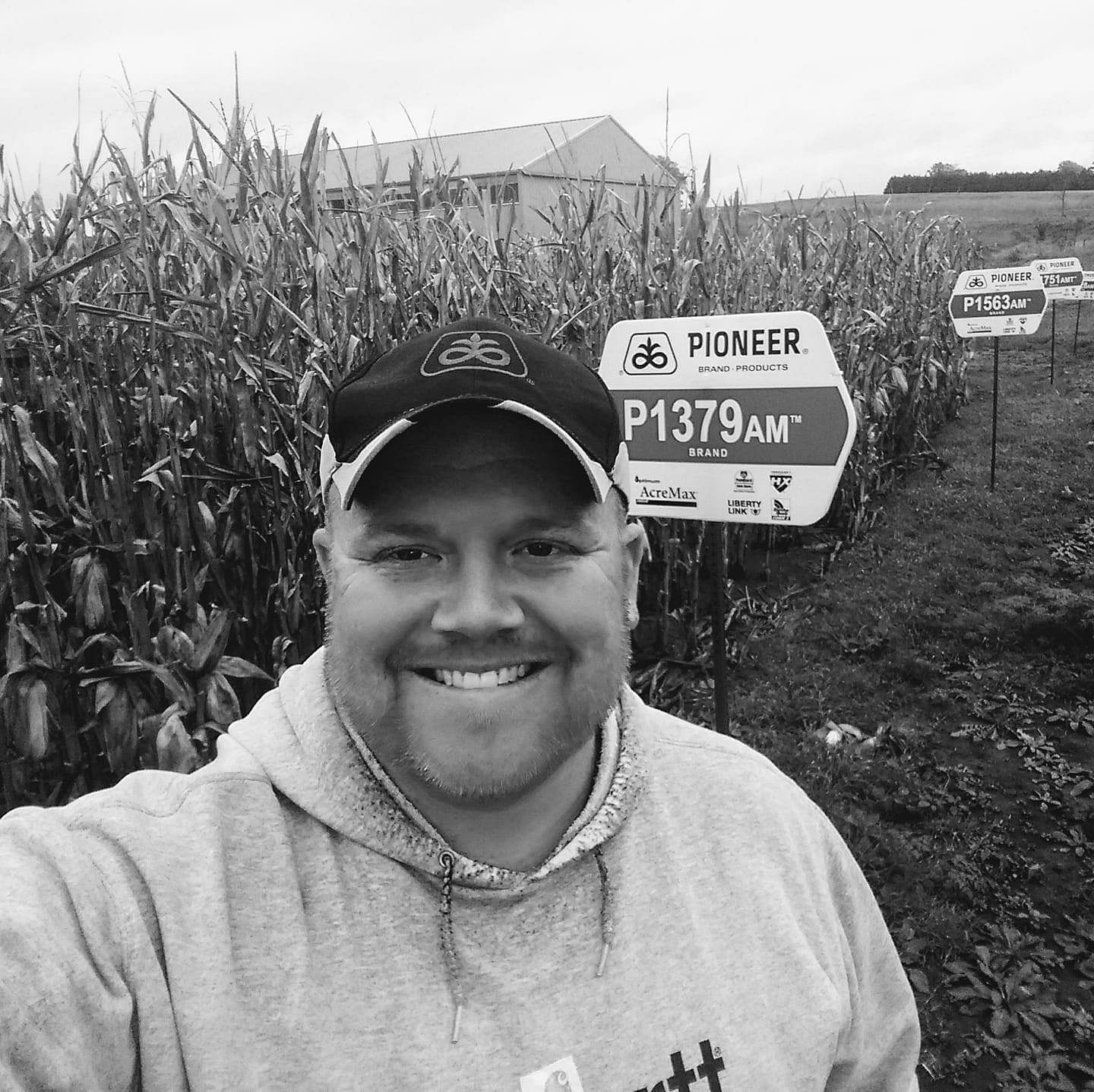Brice Volker black and white selfie in front of a corn field