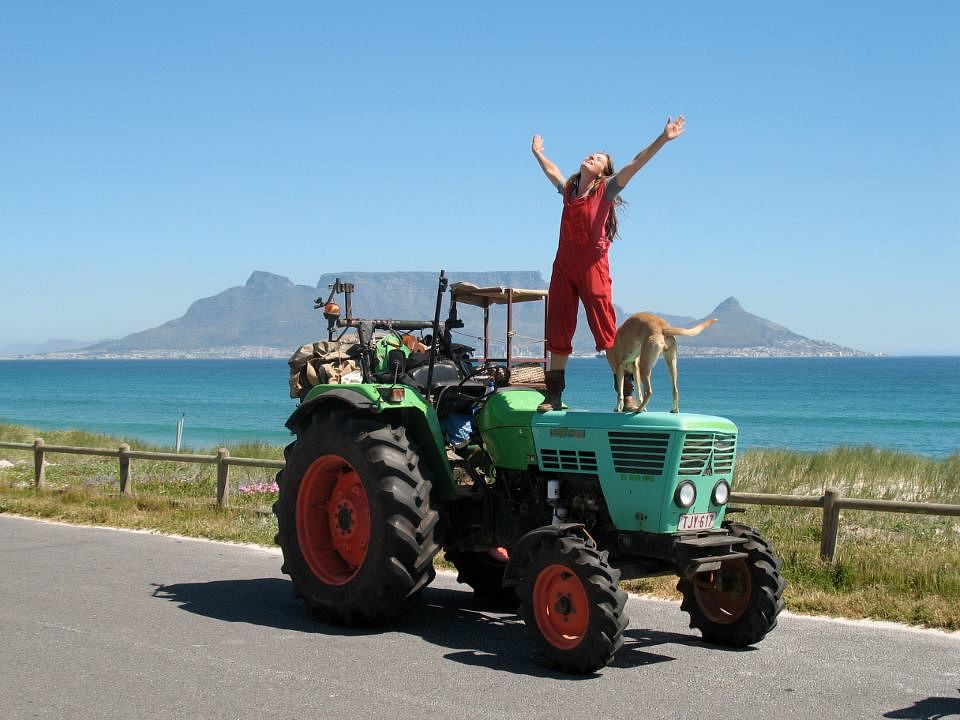 tractor girl standing on her Deutz