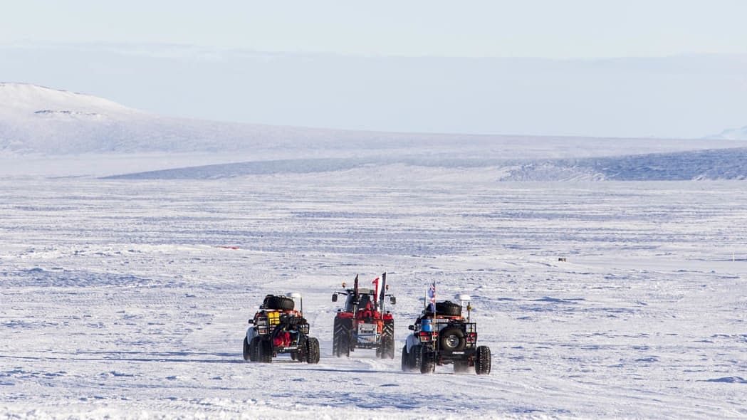 Massey Ferguson 5610 and two Arctic trucks iin Antarctica