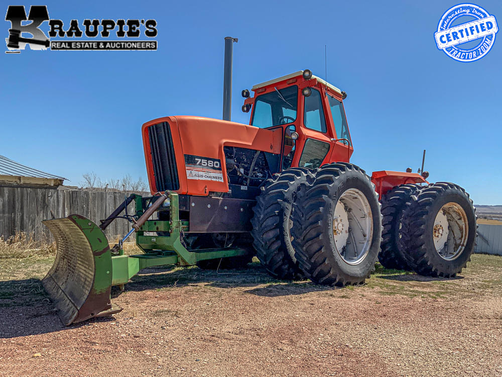 The AC "Beast" 4wd tractor with a john deere blade