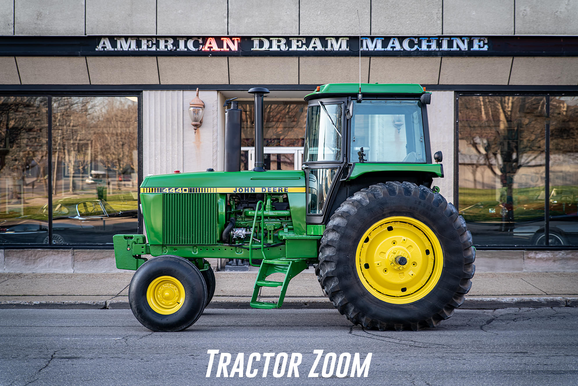 john deere 4440 in front of a building