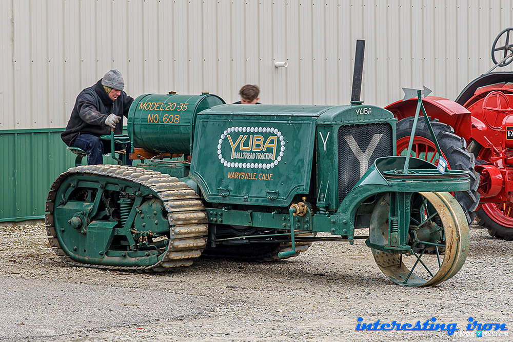 A man drives a Yuba 20-35 at the Aumann Vintage Power pre-30s auction