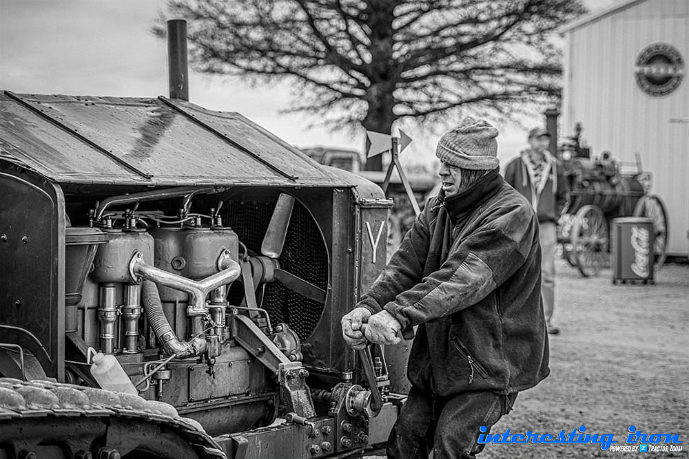 A man starts a Yuba 20-35 at the Aumann Vintage Power pre-30s auction