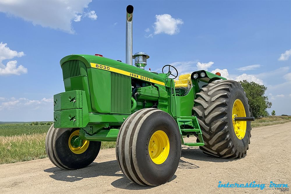 john deere 6030 on a dirt road